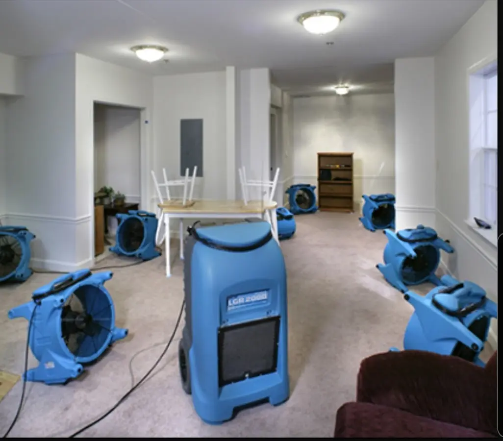Air movers and dehumidifier setup for Water Extraction & Removal in Cody